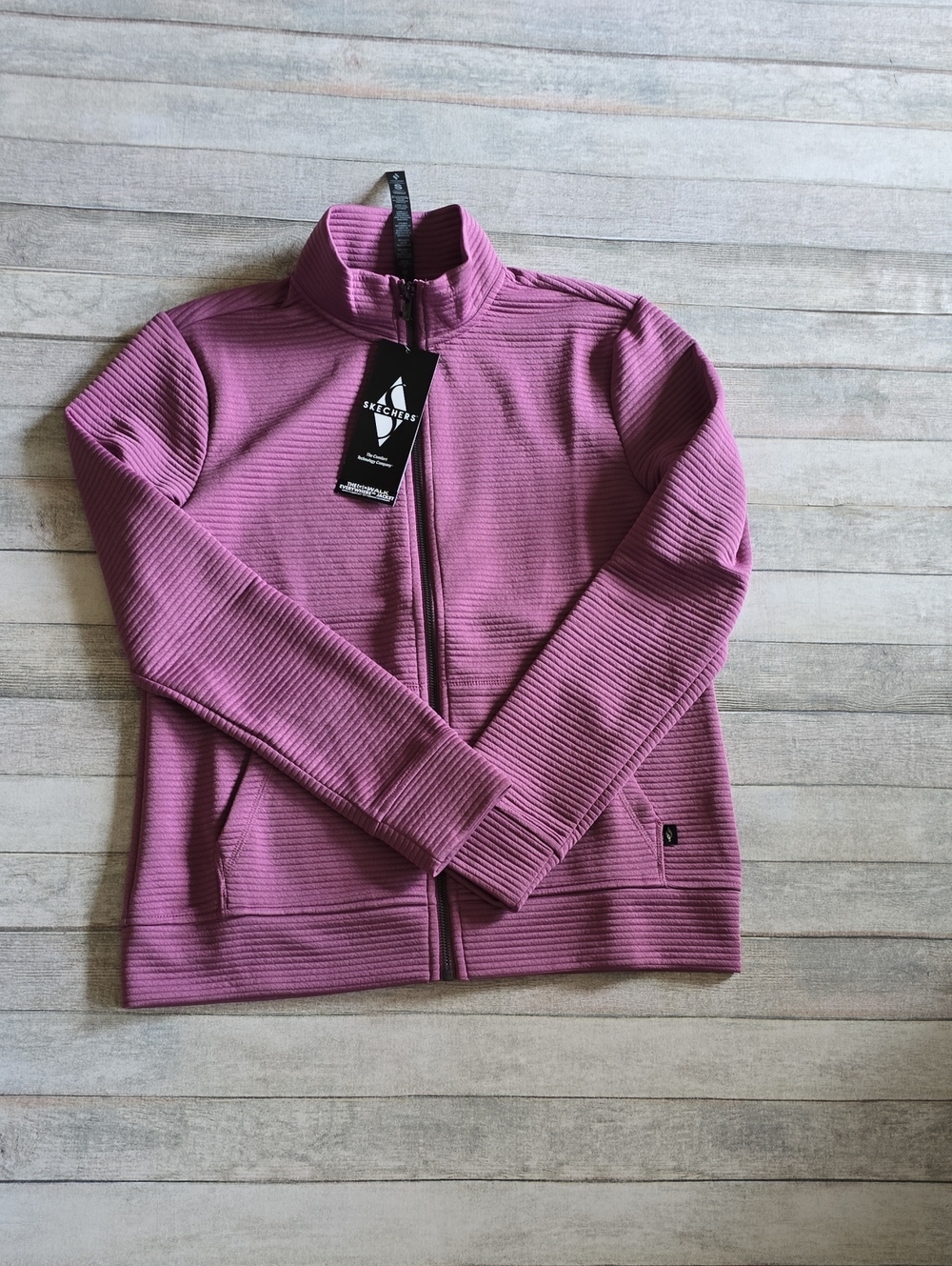 Skechers GO Walk Everywhere Women's Full-Zip Ribbed Jacket in Mauve Rose Pink
